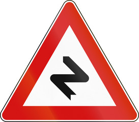 Road sign used in Malta - Dangerous curves to the right