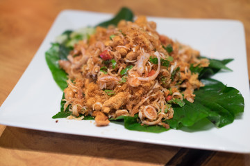 Thai food spicy salad with onion and herb