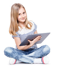 Girl with tablet. Cute  little schoolgirl with a tablet PC. © weyo