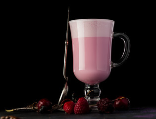 Coffee cocktail with milk and berries