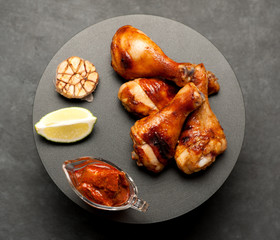Fried chicken drumsticks and pickles hot sauce