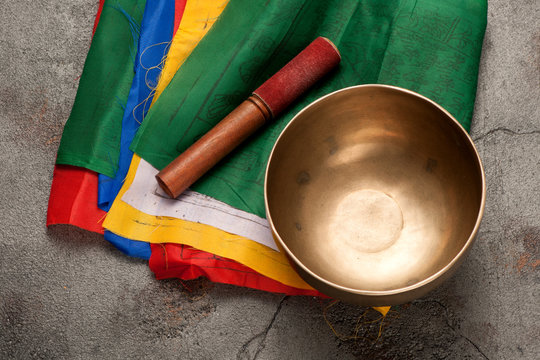 Tibetan prayer flags and singing bowl