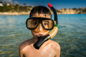 Boy in a mask for diving