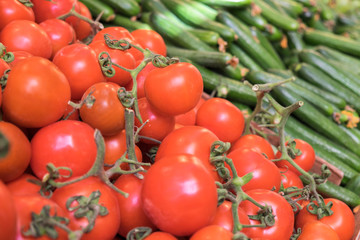 Tomatoes and cucumbers for sale at Mahane Yehuda Market, popular marketplace in Jerusalem, Israel