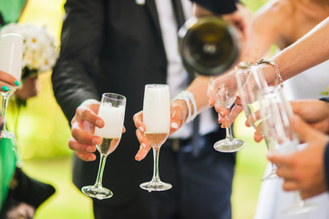 a group of people drinking champagne