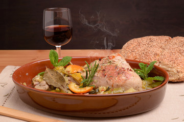 Terracotta with turkey thigh contour pepper potatoes and zucchini orange