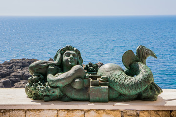 Fototapeta na wymiar Meerjungfrau Figur in Gallipoli, Italien