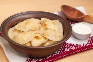 Ukrainian traditional dish - dumplings with bacon.