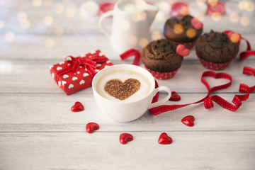 Coffee with cupcakes and heart. Adorable morning breakfast 