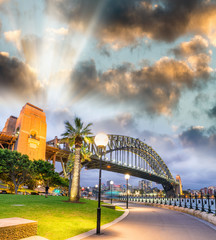 Beautiful view of Sydney Harbour Bridge with sunset sky, Australia