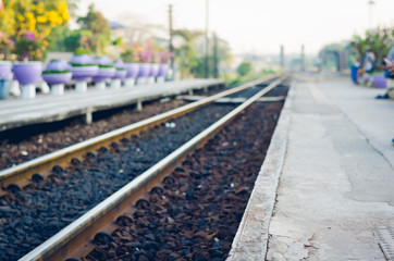 Fototapeta na wymiar blur track railway and platform train station.