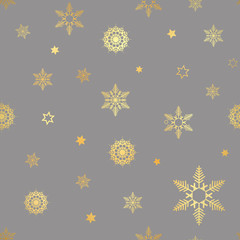luxury seamless pattern with gold snowflakes on a dark background