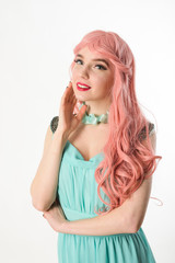 Beautiful girl smiling on a white background.