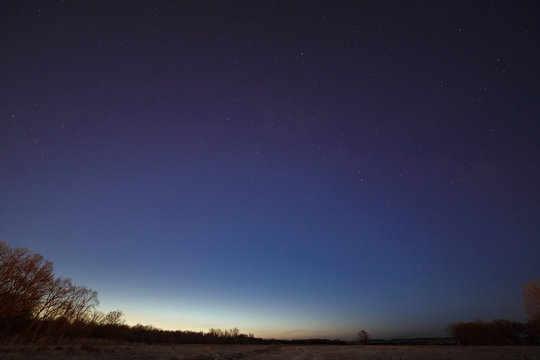 Starry sky on a background of the morning dawn.