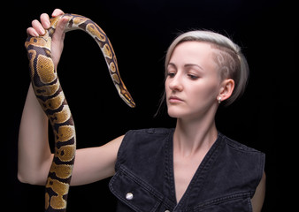 Portrait of blond woman with snake