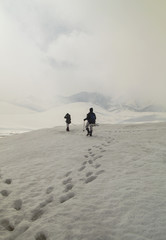 Tourists in a winter mountain