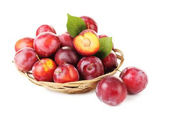 Fototapeta na wymiar Fresh plums isolated on a white
