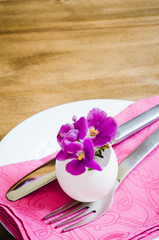 Obraz na płótnie Canvas Easter Festive Table Setting With Fresh Flower.