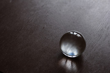 Crystal fortune-telling ball placed on a table