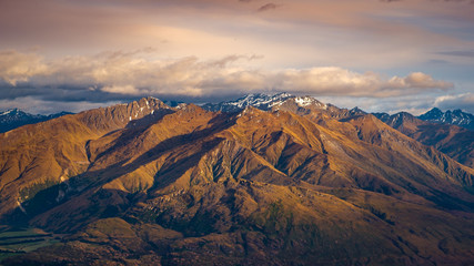 Fototapeta premium Landscape view of mountain range at sunrise, Wanaka Lake, NZ