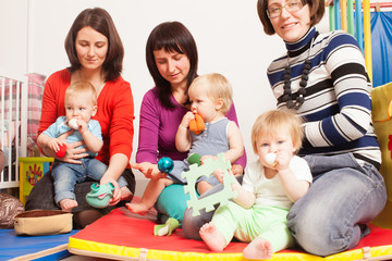 Group of mothers with their babies