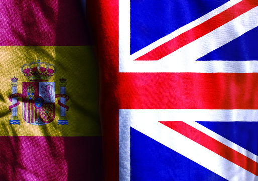 Two flags: United Kingdom. Spain.