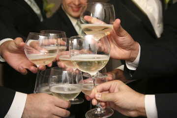 People drinking champagne on wedding