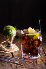 Whisky cocktail Kola with whisky, Coca and a lemon