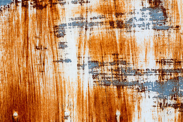 A background of peeling paint and rusty old metal