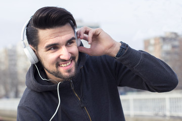 jogger with headphones on his head