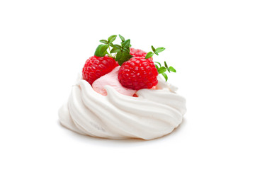 Mini  Pavlova meringue nest with berries and mint on isolated on white