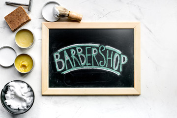 Fototapeta premium male hairdressing concept with barbershop tools on white background top view