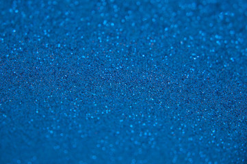 Fototapeta na wymiar blue glitter bokeh background