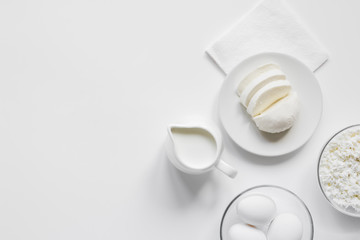 Healthy food concept with milk on white table top view mock-up