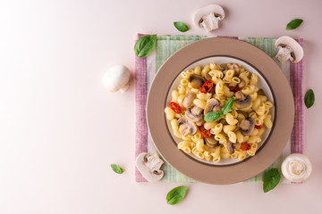 Pasta with mushrooms, chili and basil.