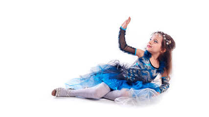Fototapeta premium Littl Girl Dancer Poses with Leg Lifted in Tap Shoes and Costume