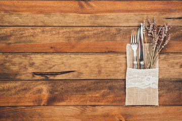 rustic table setting on wooden table with copy space 