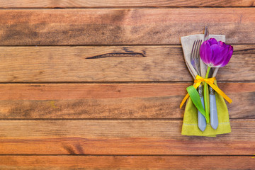 Festive table settings over wooden background with copy space 