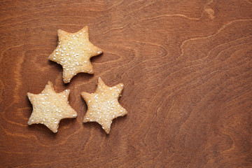 Fototapeta na wymiar Homemade cookies with sesame on wooden table top view