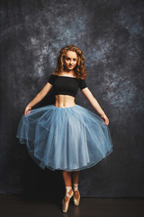 Ballet dancer in blue skirt and Ballet Shoes