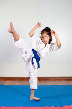 Children during training in karate. Fighting position