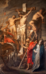 GENT - JUNE 23: Christ on the Cross between two Thieves by Pieter Pauwel Rubens (1619 a.d.) in...