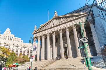NEW YORK CITY - SEPTEMBER 2015: Tourists visit New York County Courthouse in Manhattan. The city...