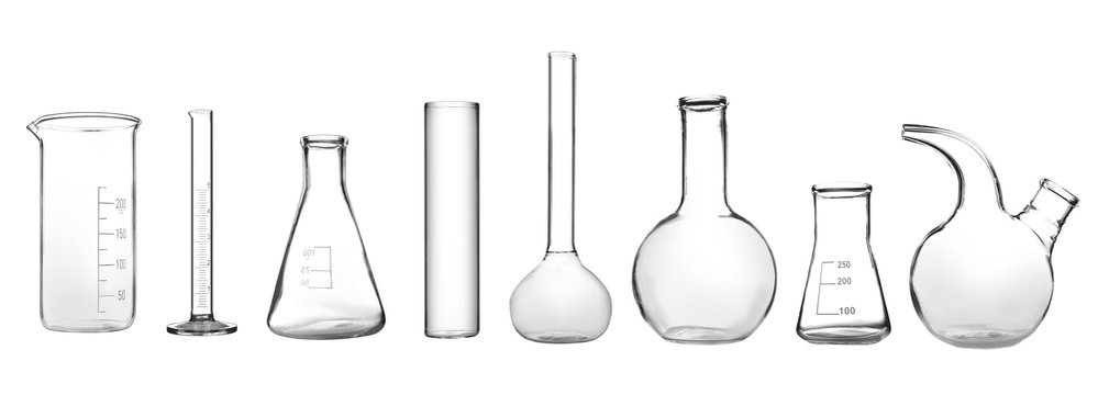 Set of laboratory glassware on white background