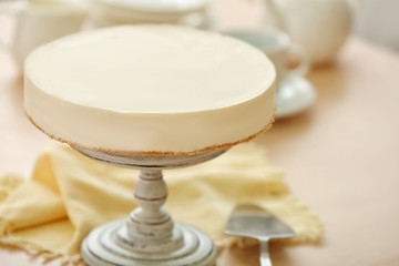 Delicious cheesecake on stand