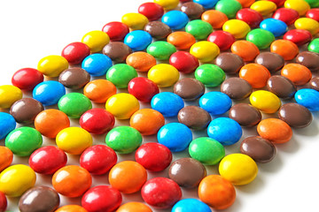 Delicious candies on white background