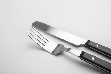 Fork and knife on white background