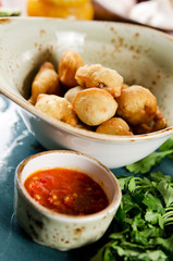 Chuchvara. Fried dumplings with lamb and spicy sauce. Traditional dish of cuisine in Central Asia