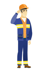 Angry man gesturing with his finger against temple