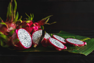 Fresh Dragonfruits on the dark background